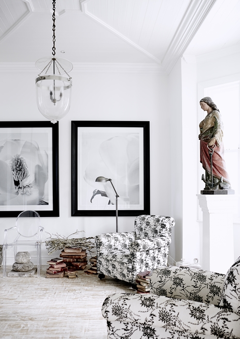 The black and white oversized photographs in this seating area are by Johannesburg husband and wife team Dook and Leanna.