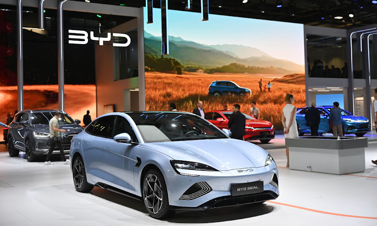 Tesla faces potent rivals including BYD, pictured, China's largest EV maker, and Huawei, a smartphone maker emerging as a national tech champion, that have rolled out systems designed to navigate China's densely packed urban landscapes.