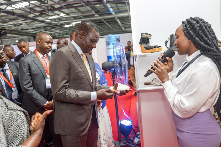 President William Ruto samples some of the products at Nextgen Export Processing Zone in Mavoko, Machakos, during its official opening on April 23, 2024.
