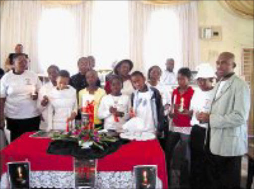 REMEMBRANCE: The Apostolical Holiness Church in Daveyton celebrated International Candlelight Memorial Day for people infected or affected by HIV/aids. Pic. Dan Fuphe. 05/2008.