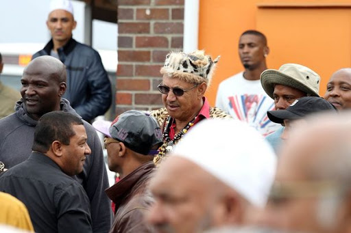 Alleged former gang boss Ernie Lastig Solomon, right and controversial businessman Jerome Donkie Booysen , bottom left, attend the funeral of well-known defence lawyer Noorudien Hassan last year. Pic: Esa Alexander. © The Times