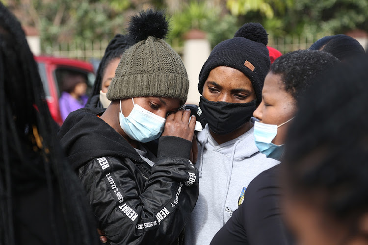 University of Fort Hare students Ruth Williams and Siyabulela Gamnca, who were friends of murdered Nosicelo Mtebeni, in Quigney to call for action against gender-based violence.