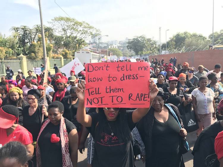 FILE IMAGE: About 800 marchers armed with placards calling for the dismantling of patriarchy and the protection of women make their way through the streets of Durban to the city hall.