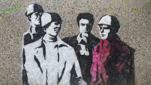 Four Men on a Wall