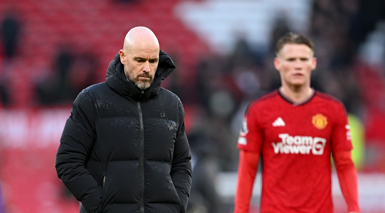 Manchester United manager Erik ten Hag, left, looks dejected following the team's defeat during their Premier League match against Fulham FC at Old Trafford on February 24 2024 in Manchester, England. Picture: MICHAEL REGAN/GETTY IMAGES