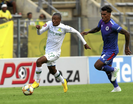 Thapelo Morena of Sundowns outruns SuperSport United's Clayton Daniels during their league match at Lucas Moripe Stadium in Pretoria yesterday.