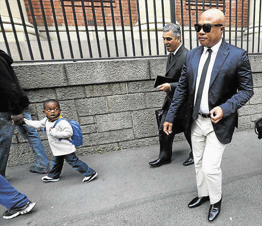 INFLUENCE: ANC NEC member Tony Yengeni leaves the Cape Town Magistrate's Court yesterday. The former ANC chief whip is charged with drunk driving