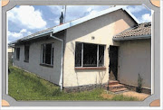 FIRE DAMAGED: Annie Phungula's  house   burnt after  her ex-husband allegedly poured petrol over her and set her alight.