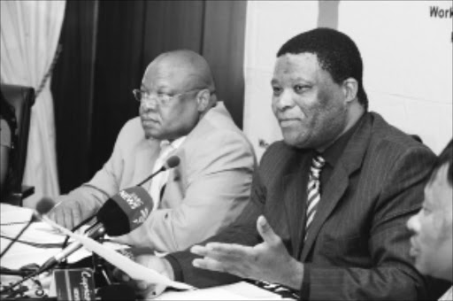 BY THE BOOK: Limpopo department of education MEC Namane Masemola, right, and his head of department Benny Boshielo at a media briefing. Pic: ELIJAR MUSHIANA. 11/01/2010. © Sowetan.