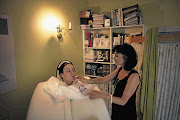 Colleen Faulconbridge assists Emma Jordan during an ozone therapy session Picture: DANIEL BORN