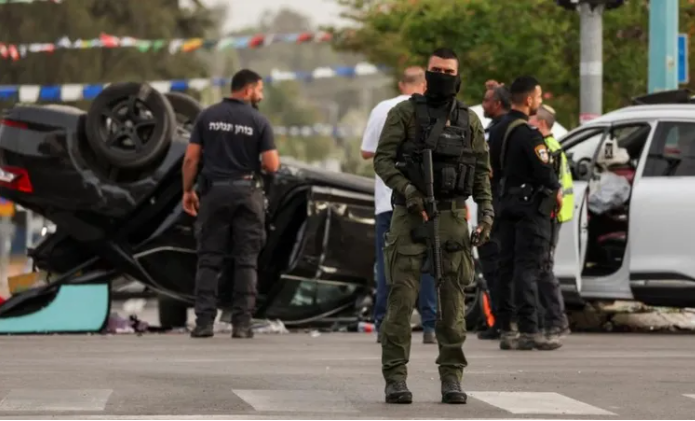 Security forces at the scene of the accident involving Mr Ben-Gvir's car