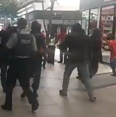 There were chaotic scenes as security guards and police engaged a group of protesters outside Clicks at a Kempton Park mall on Thursday.