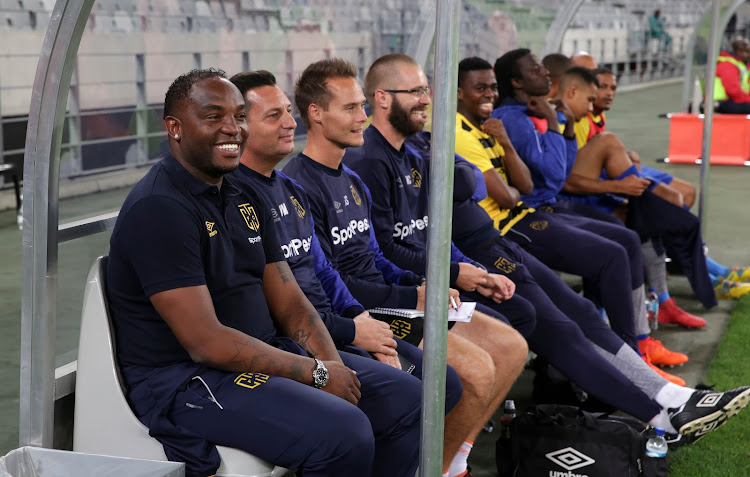 Cape Town City coach Benni McCarthy and his bench share a funny moment during the Absa Premiership match against Lamontville Golden Arrows at Cape Town Stadium.