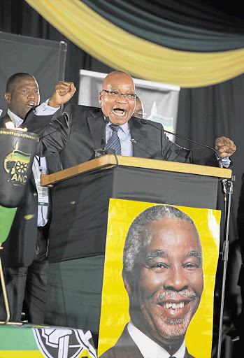 President Jacob Zuma sings before he delivers the Presidential Centennial Lecture on former president Thabo Mbeki at the Sauer Park Stadium in Aliwal North in the Eastern Cape. File photo.