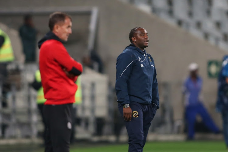 Cape Town City FC head coach Benni McCarthy (R) alongside his Orlando Pirates counterpart Milutin Sredejovic during the Nedbank Cup, Last 16 match at Cape Town Stadium on March 14, 2018 in Cape Town, South Africa. City won 1-0 to advance to the quarterfinals courtesy of a Ayanda Patosi goal.