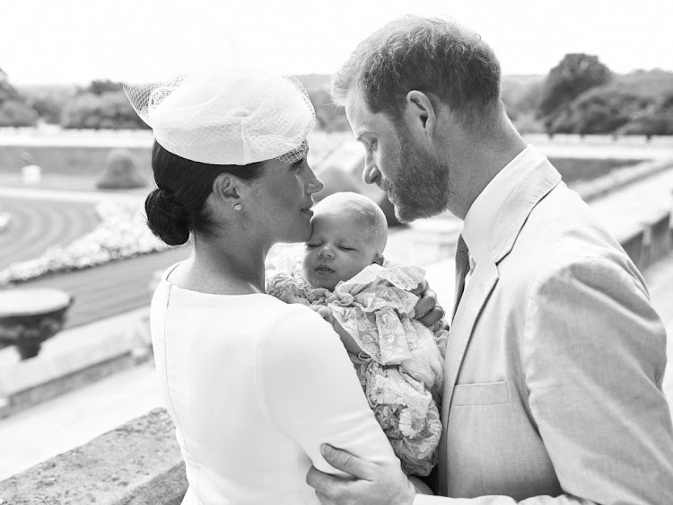 Prince Harry and Meghan, Duchess of Sussex, pose with their son, Archie Mountbatten-Windsor, on the day of his christening, July 6 2019, at Windsor Castle, United Kingdom.