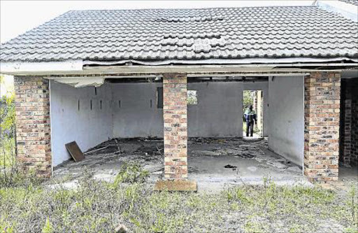 ONCE A HOME: Ascot residents are up in arms over a Beacon Bay house belonging to BCM that has been vandalised and stripped of all its fixtures and fittings is strewn with debris and human excrement Picture: STEPHANIE LLOYD