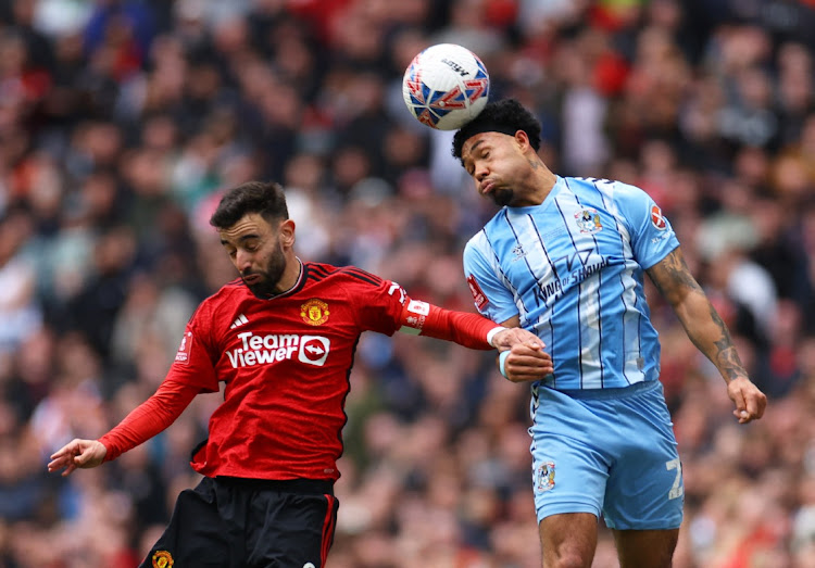 Coventry City's Milan van Ewijk in action with Manchester United's Bruno Fernandes in the FA Cup semifinal at Wembley Stadium in London on Sunday.