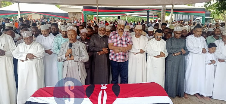 Imamns lead Aswalatul janazah (prayer for the dead) for the late Brigadier Swaleh Nzaro Said at his mother's home in Majaoni, Kisauni subcounty.