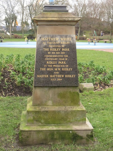 The plaque, on a column which looks much older than the plaque, commemorates the centenary of the park. The text on the plaque reads: MATTHEW WHITE 1ST VISCOUNT RIDLEY PRESENTED TO THE RIDLEY PARK...