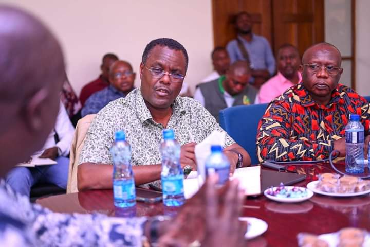 President’s Council of Economic Advisers agriculture and value chain adviser Augustine Cheruiyot with Kilifi North MP Owen Baya in Kilifi on Thursday.