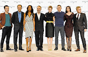 TIES THAT BOND: The cast and director of the new James Bond movie: Andrew Scott, Ralph Fiennes, Naomie Harris, director Sam Mendes, Lea Seydoux, Daniel Craig, Monica Bellucci and Christoph Waltz