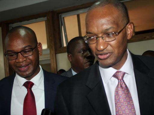 CBK governor Patrick Njoroge and KCB chief executive Joshua at a past press briefing. /FILE