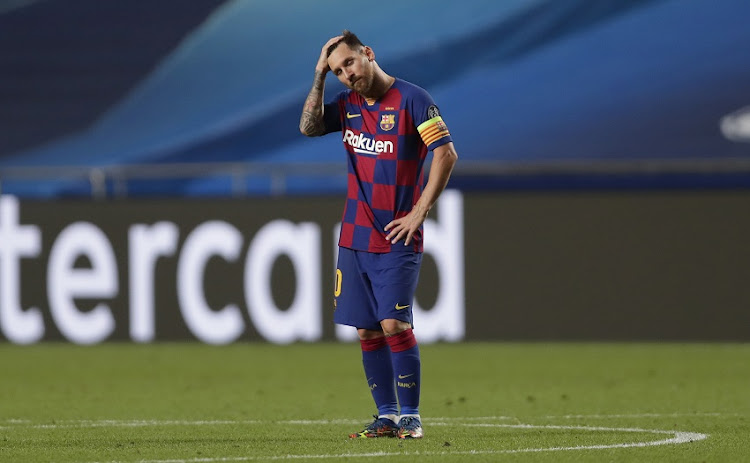 Lionel Messi of FC Barcelona looks dejected during the UEFA Champions League Quarter Final match between Barcelona and Bayern Munich at Estadio do Sport Lisboa e Benfica on August 14, 2020 in Lisbon, Portugal.