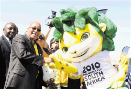 President Jacob Zuma with Zakumi at the 50 days countdown to FIFA world cup celebrations hosted by South Africa in June and July 2010.