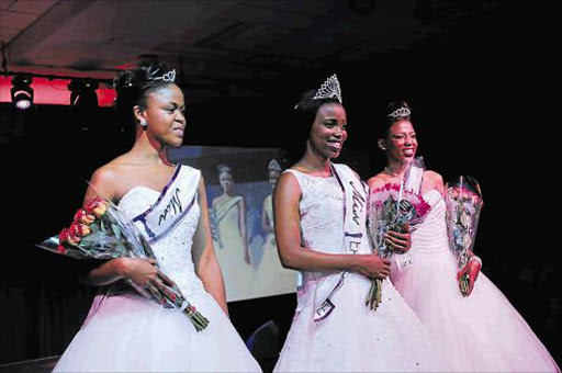 LAMOUR GALORE: Zimi Mabunzi of King William’s Town was crowned Miss Eastern Cape on Sunday evening with Zingcwele Songwelwa, left, as her first princess and Aphiwe Mnqunyana her second