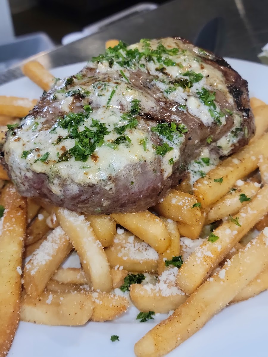 Gluten free steak and fries with herb butter
