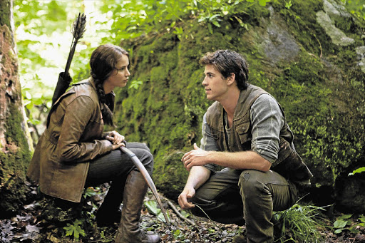 Jennifer Lawrence and Liam Hemsworth in a scene from the blockbuster film 'The Hunger Games'.