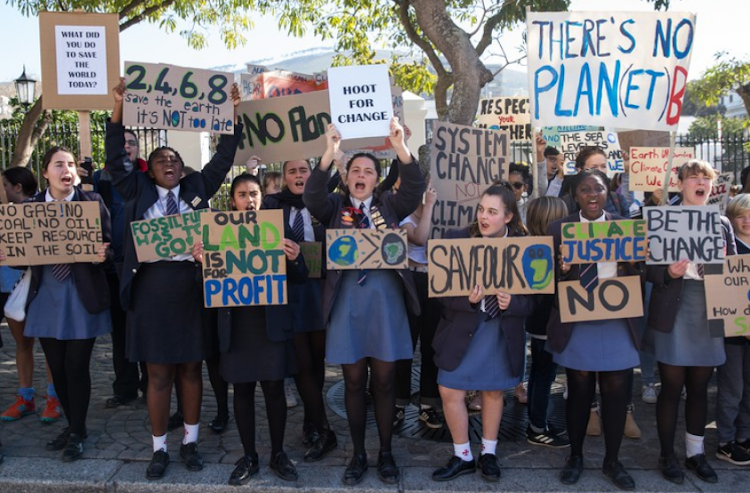 About 300 young people, mostly school learners, marched from Parliament to the City Hall in Cape Town to hand over a memorandum demanding government take “immediate action on the climate crisis” on Youth Day.