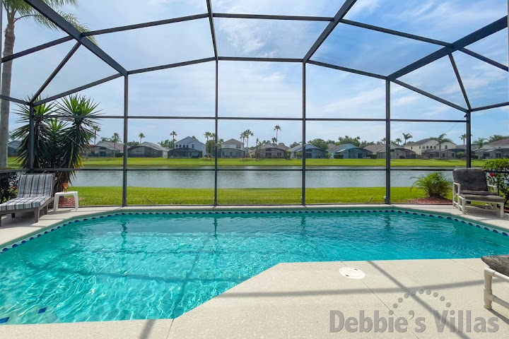 Stunning lake view from the pool deck of this Kissimmee vacation villa