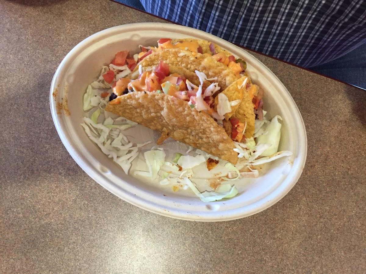 Fish tacos with slaw and Siracha Sauce. Generous portion of grilled fish!