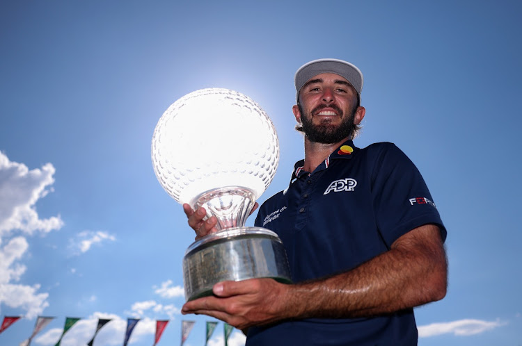 Max Homa of the US poses with the trophy as he celebrates victory after winning the tournament during the final round of the Nedbank Golf Challenge at Gary Player Country Club in Sun City, November 12 2023. Picture: WARREN LITTLE/GETTY IMAGES