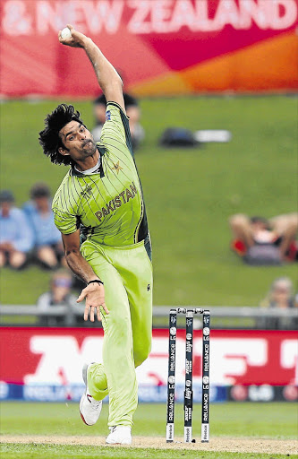 SPEED DEMON: Pakistan's Mohammad Irfan during the match against United Arab Emirates in Napier yesterday. Pakistan won by 129 runs after posting 339/6 in their 50 overs.In the other game yesterday, Australia posted the highest-ever World Cup total of 417/6 on their way to crushing Afghanistan by 275 runs