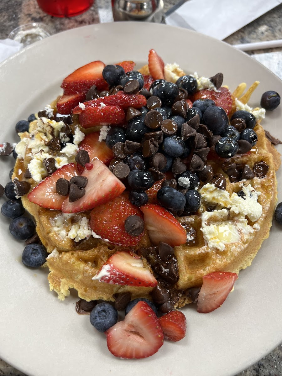GF waffle with strawberries, blueberries, and chocolate chips