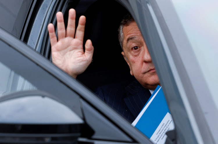 Newly appointed governor of the Bank of Italy, Fabio Panetta, waves as he leaves a banking conference in Rome, Italy, November 30 2023. Picture: REMO CASILLI/REUTERS