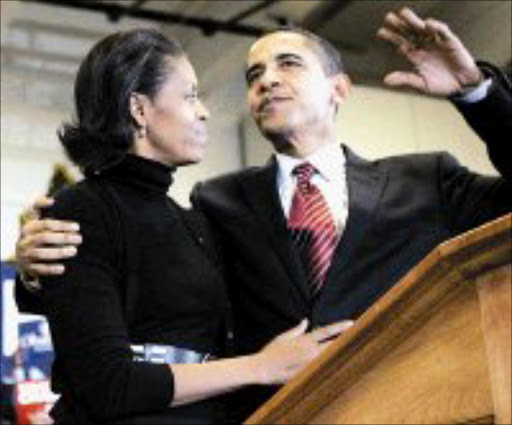 HIGH HOPES: Democratic presidential hopeful Barack Obama and his wife Michelle. Pic. M Spencer Green. 02/01/2008. © Sowetan.