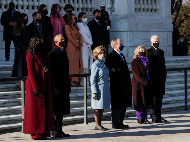 Former US President Bill Clinton with his wife, former Secretary of State, Hillary Clinton, former US President George W. Bush with his wife Laura Bush, and former US president Barack Obama and his wife Michelle Obama wait for US President Joe Biden at the Arlington National Cemetery, in Arlington, Virginia, US, on January 20, 2021.