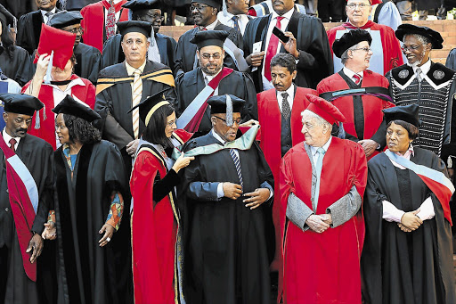 Health Minister Aaron Motsoaledi at the graduation at the University of Pretoria yesterday of 62 medical students in the South Africa-Cuba medical training programme. The programme has produced 366 doctors since its inception in 1995