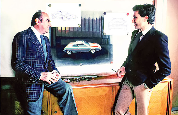 Nuccio Bertone and Marcello Gandini, right, with the Ferrari Rainbow drawings in 1975/76.