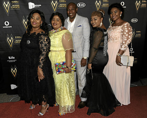 Polygamist Musa Mseleku, seen here with his wives Nokukhanya, Busisiwe, Mbali and Thobile, has welcomed the Constitutional Court ruling. / Veli Nhlapo