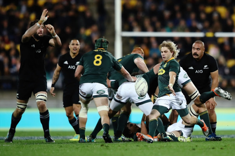 Far de Klerk of South Africa kicks the ball through during The Rugby Championship match between the New Zealand All Blacks and the South Africa Springboks at Westpac Stadium on September 15, 2018 in Wellington, New Zealand.