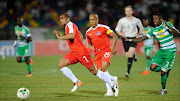 Bryce Moon and Kurt Lentjies of Maritzburg United and Mthokozisi Dube of Celtics during the Absa Premiership match between Bloemfontein Celtic and Maritzburg United at Dr. Molemela Stadium on August 24, 2016 in Bloemfontein, South Africa. (Photo by Charle Lombard/Gallo Images)