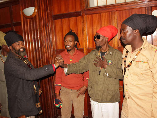 Rastafarians among them John Wambua alias Prophet (second from right) the father of a dreadlocked girl who was denied admission to Olympic high School for not having shaved her hair at a Milimani court /COLLINS KWEYU
