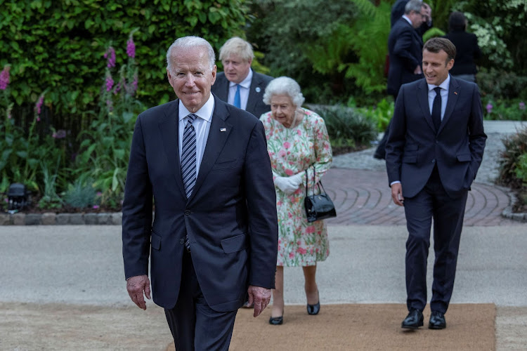 Britain's Queen Elizabeth, U.S. President Joe Biden, Britain's Prime Minister Boris Johnson and France's President Emmanuel Macron attend a drinks reception on the sidelines of the G7 summit, at the Eden Project in Cornwall, Britain June 11, 2021.