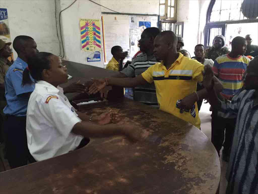 Cord protesters at Central Police station in Mombasa after arrest of county assembly speaker and an MCA Photo/Elkana Jacob