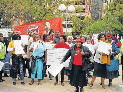 CLEAR DEMANDS: Nehawu members marched to the office of the department of health in Mthatha yesterday to hand over a memorandum of demands picture: ZIPO-ZENKOSI NCOKAZI